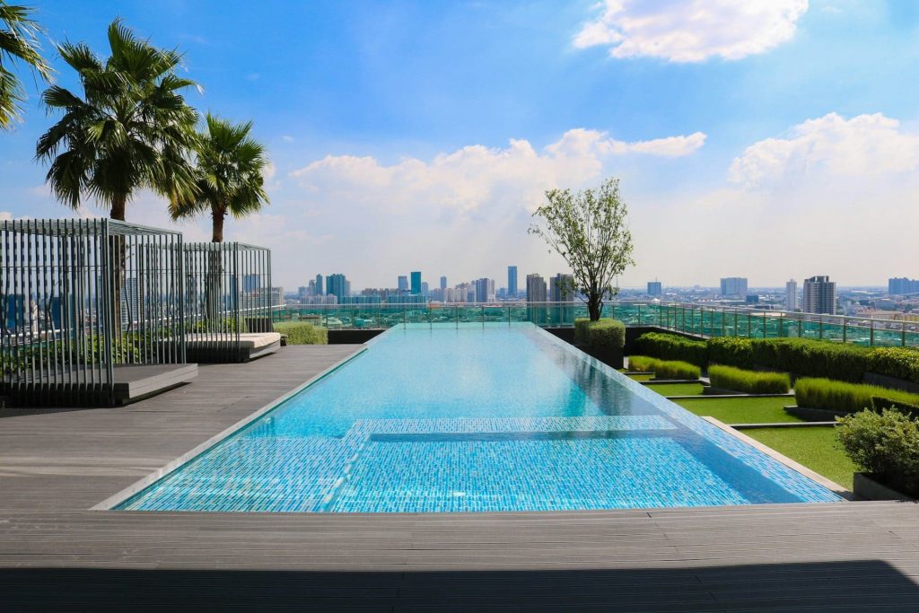 Pool next to palm trees